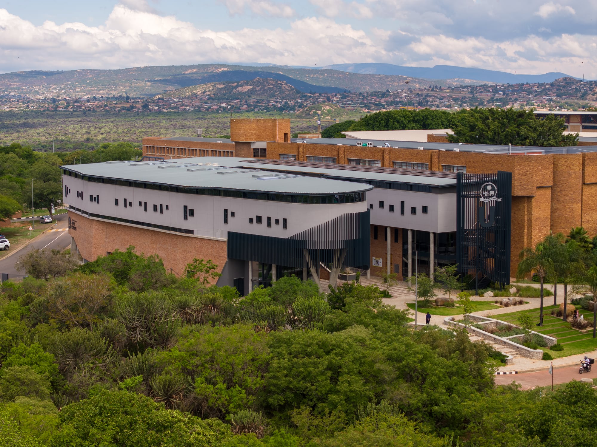 Aerial view of the Earth Sciences Building within the university's academic core