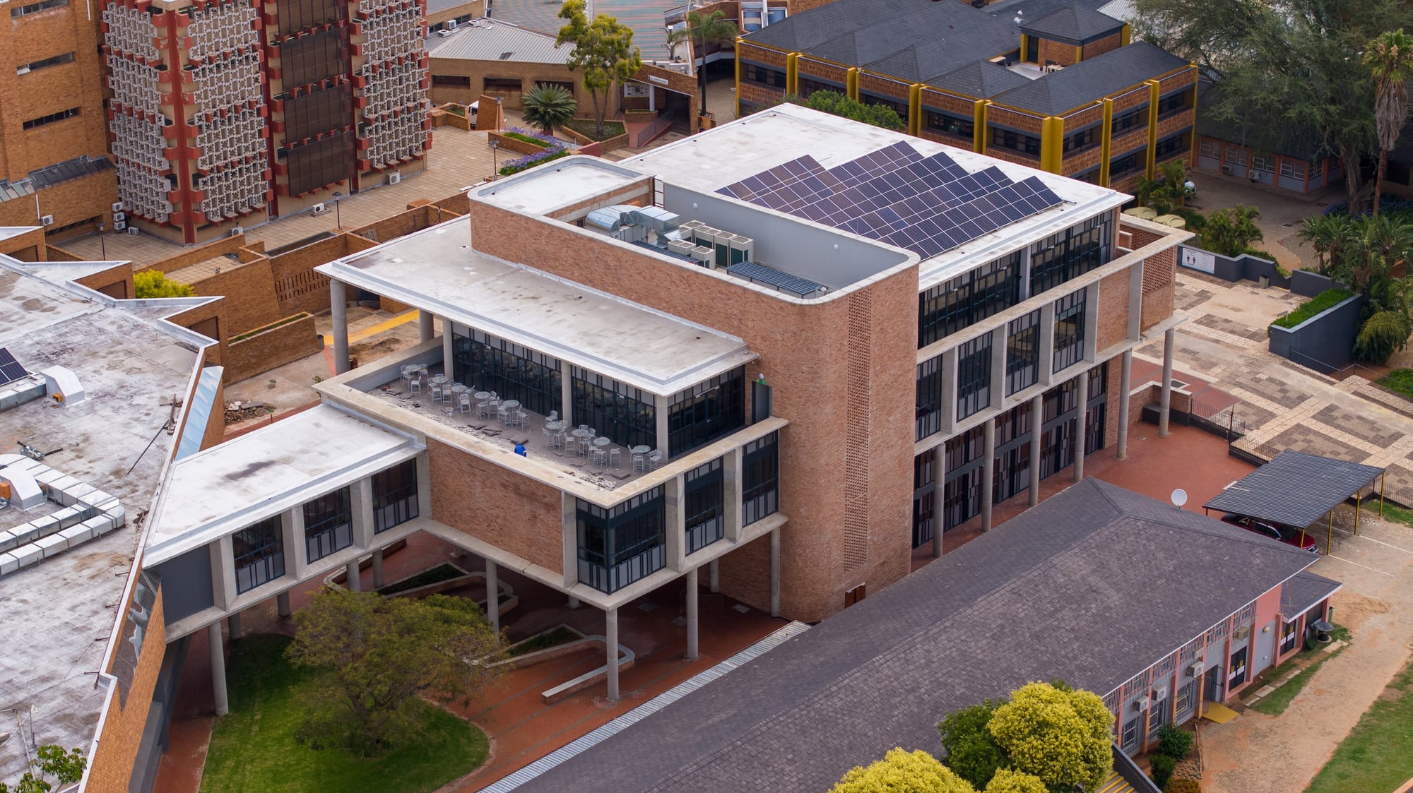 Engineered second-floor bridge connecting the new extension to the original library